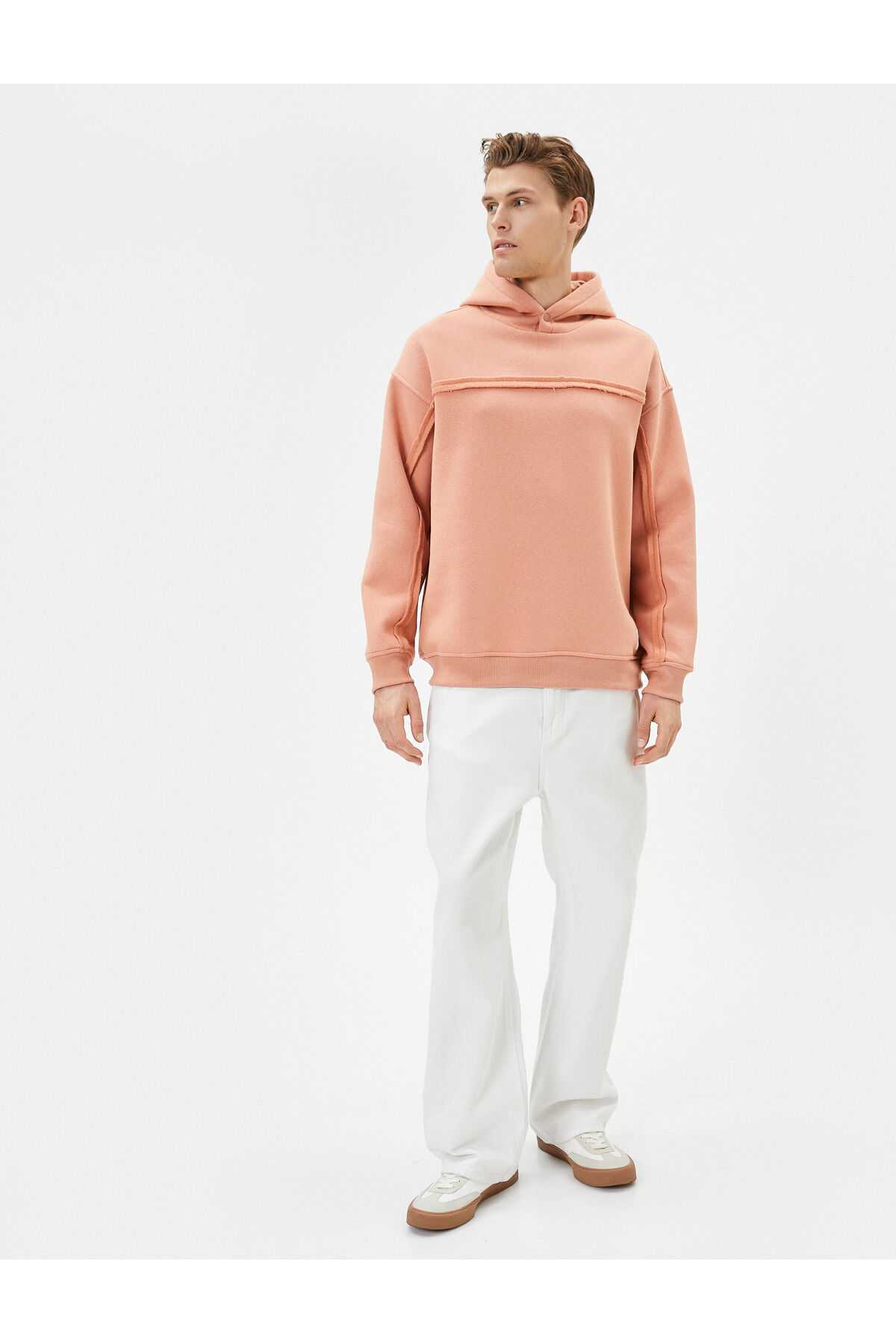 سویشرت کلاهدار بزرگ با جزئیات دوخت آستین بلند