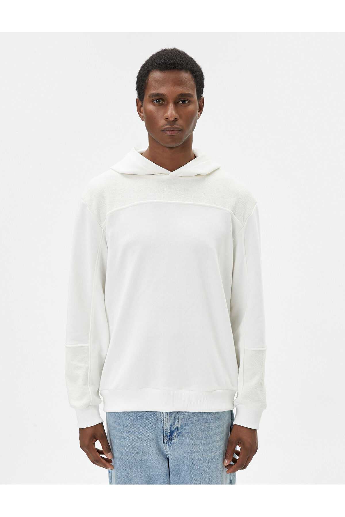 سویشرت کلاهدار با جزئیات دوخت بافتی آستین بلند