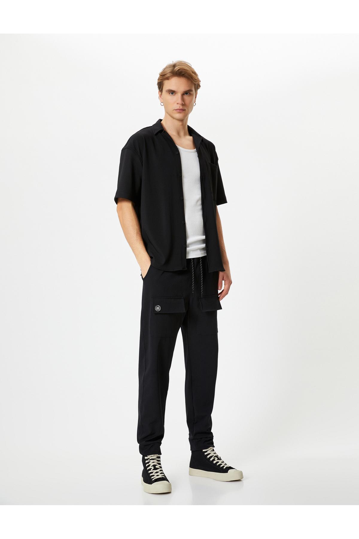 پیراهن تابستانی آستین کوتاه با یقه روکش دکمه ای با جزئیات