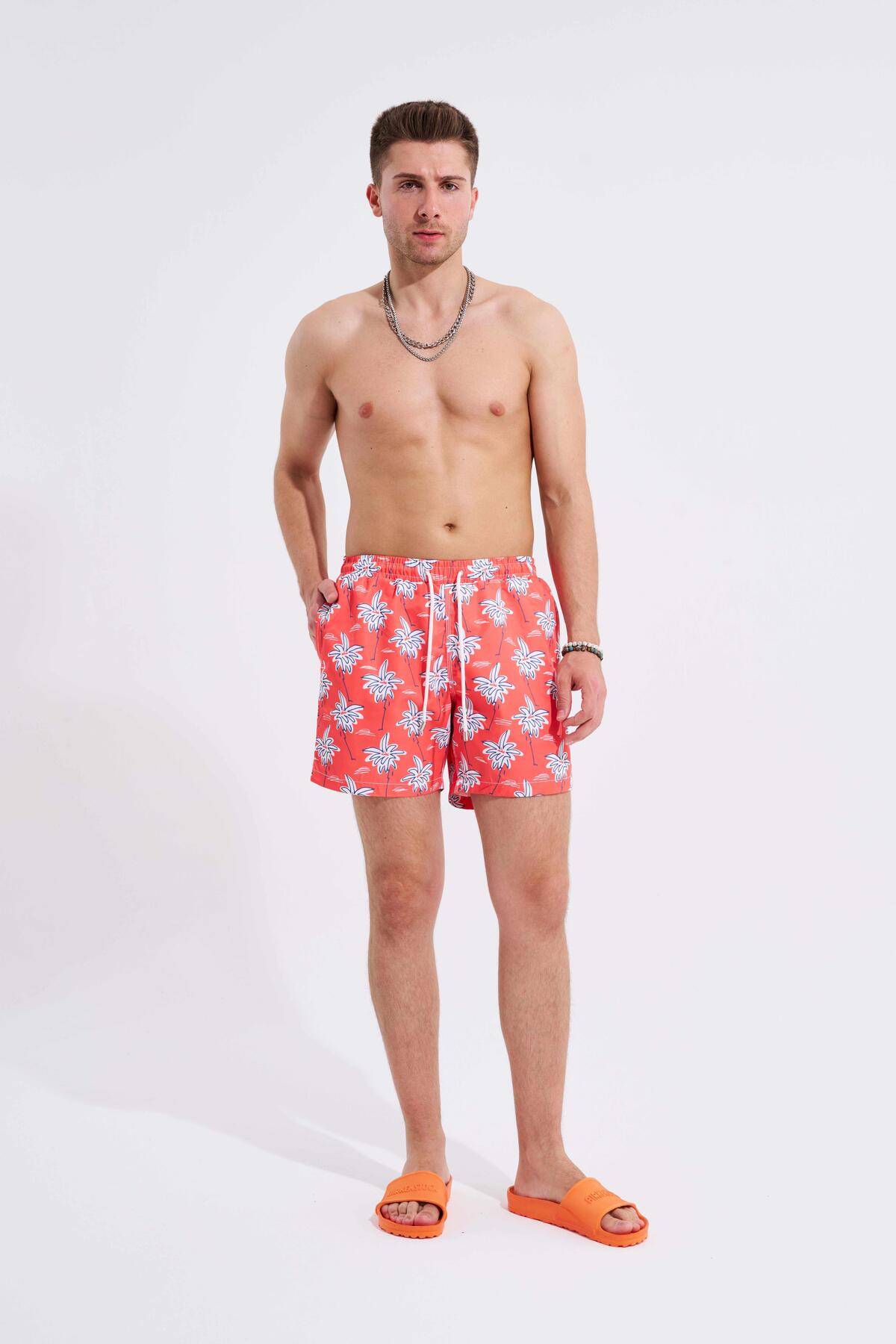 شورت شنای قرمز چاپ نخل مردانه