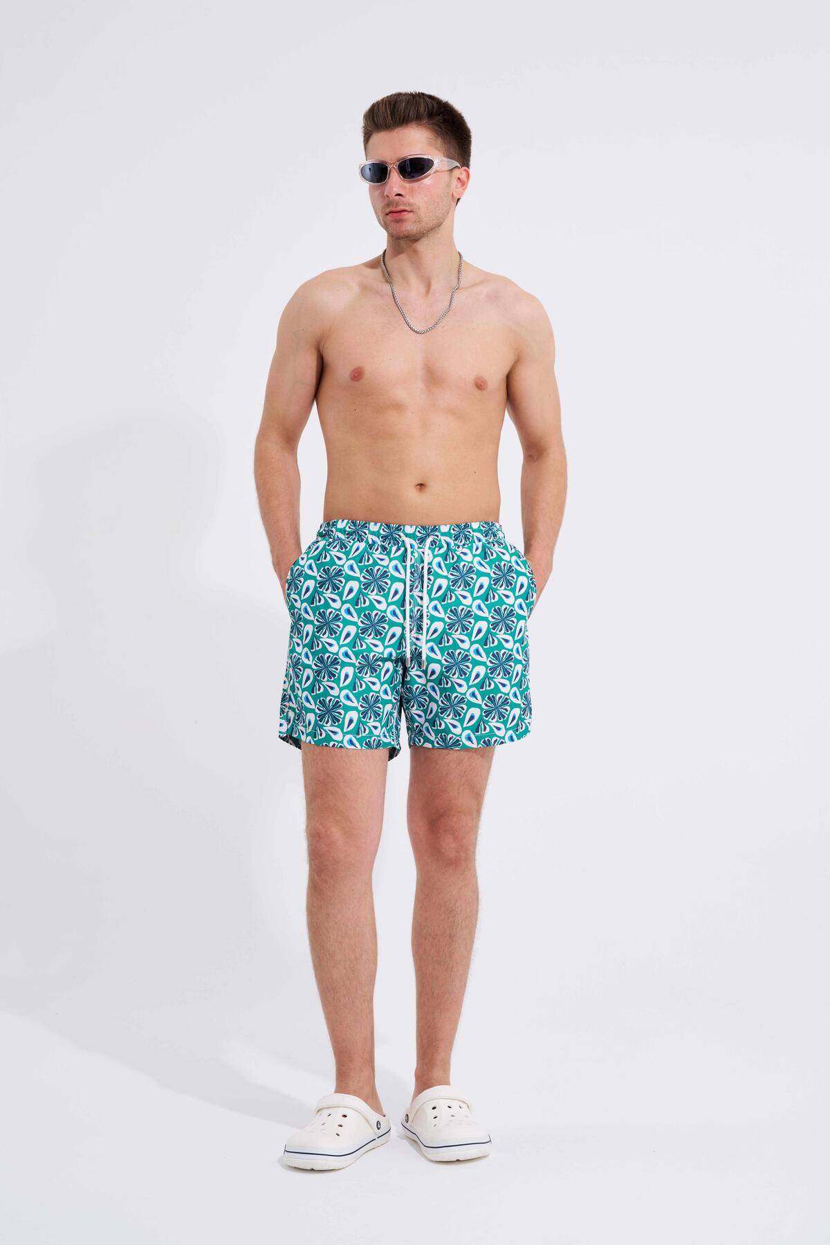 شلوار شنای سبز با چاپ گل مردانه