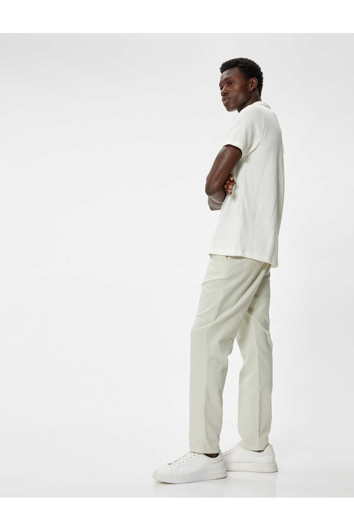 شلوار کتان چینو دکمه دار با جزئیات جیب