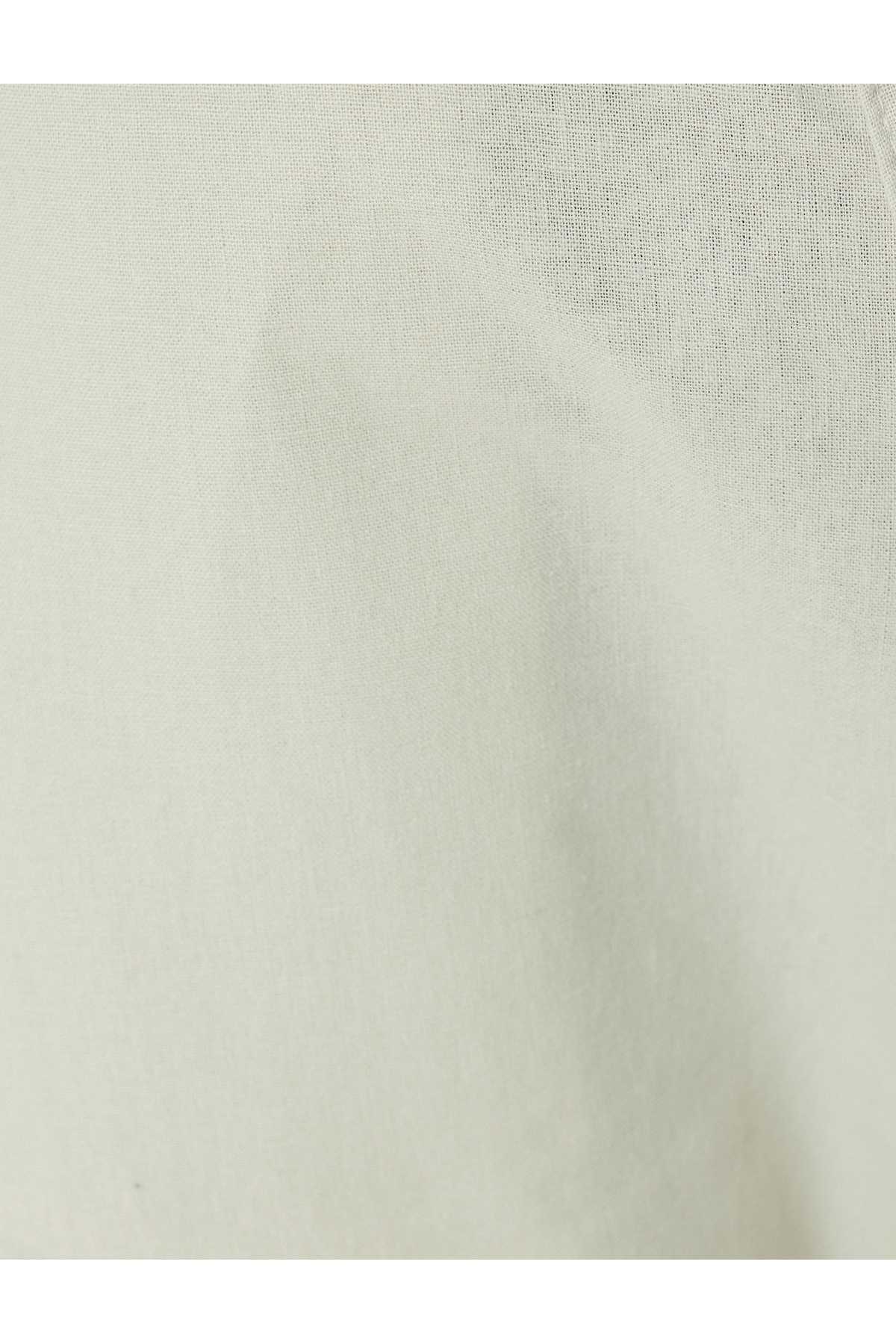 شلوار کتان چینو دکمه دار با جزئیات جیب