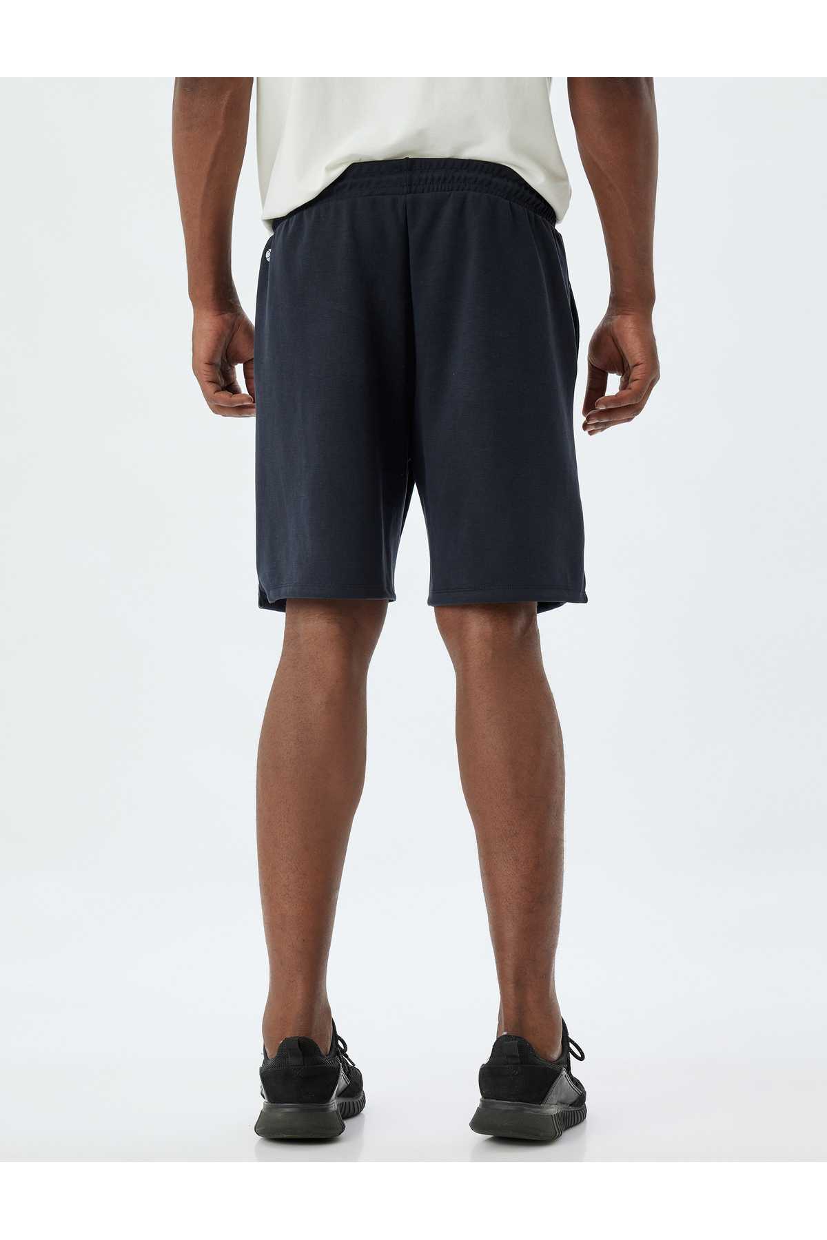 Sports کوتاه کمر کوتاه جزئیات موبایل مودال مخلوط