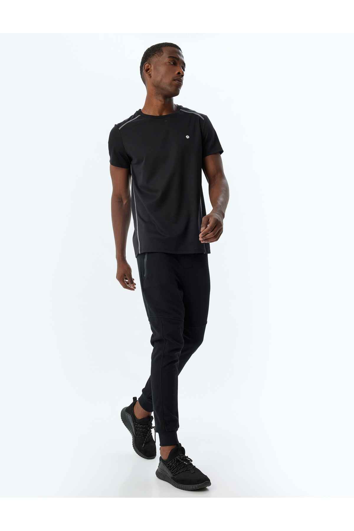 شلوار ورزشی اسپرت دوخت توری دور کمر ترکیبی پنبه ای با جزئیات