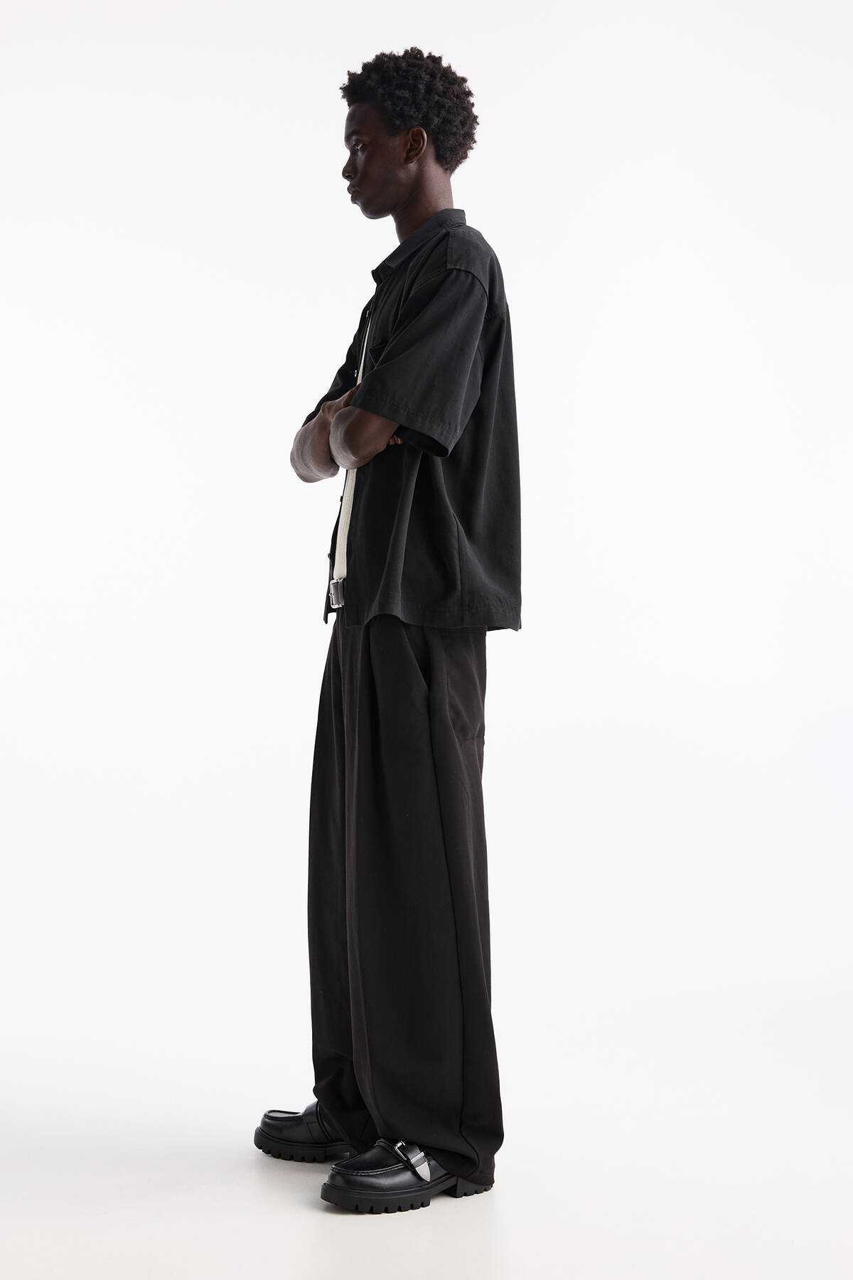 شلوار پارچه ای با دارت