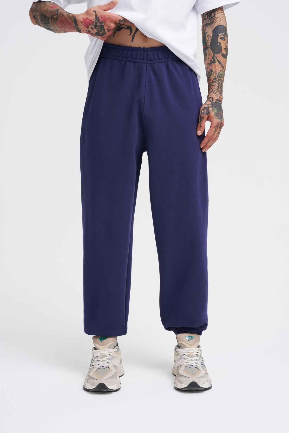 شلوار گرمکن آبی سرمه ای مورب پایه مردانه