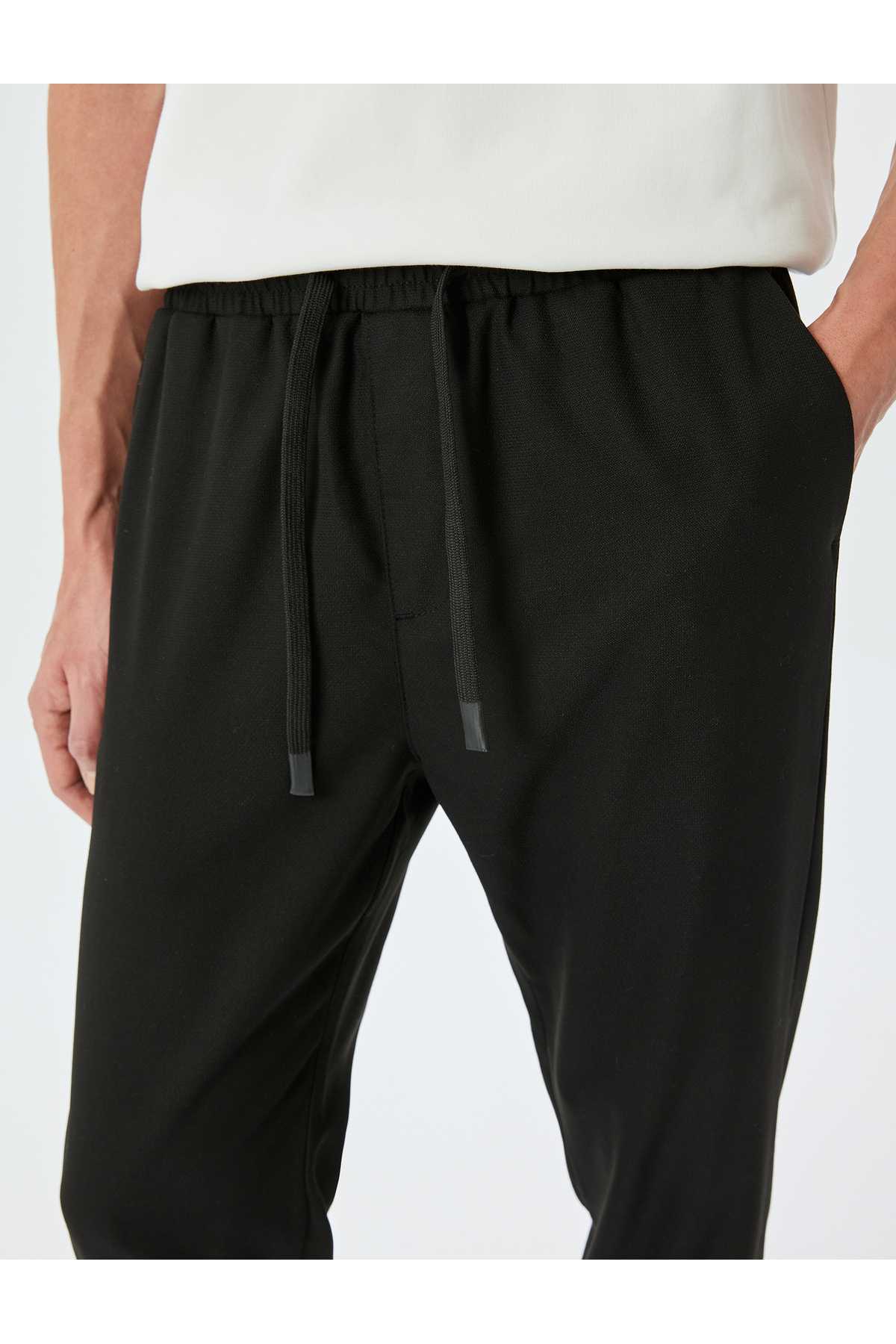 شلوار ترکیبی ویسکوز باریک با جزئیات جیب و کمربند