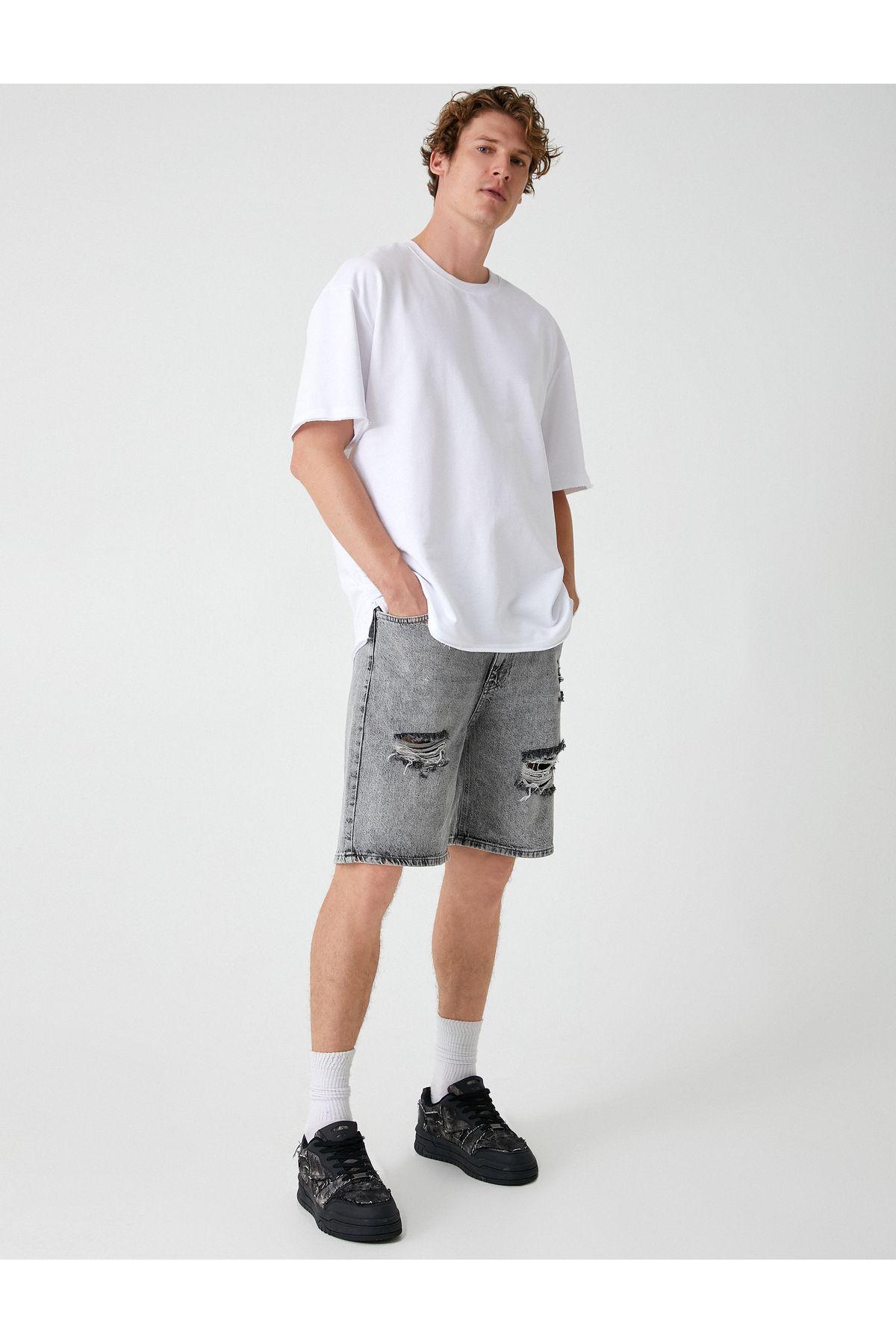 شلوارک جین سایز بزرگ برمودا با جزییات جیبی فرسوده