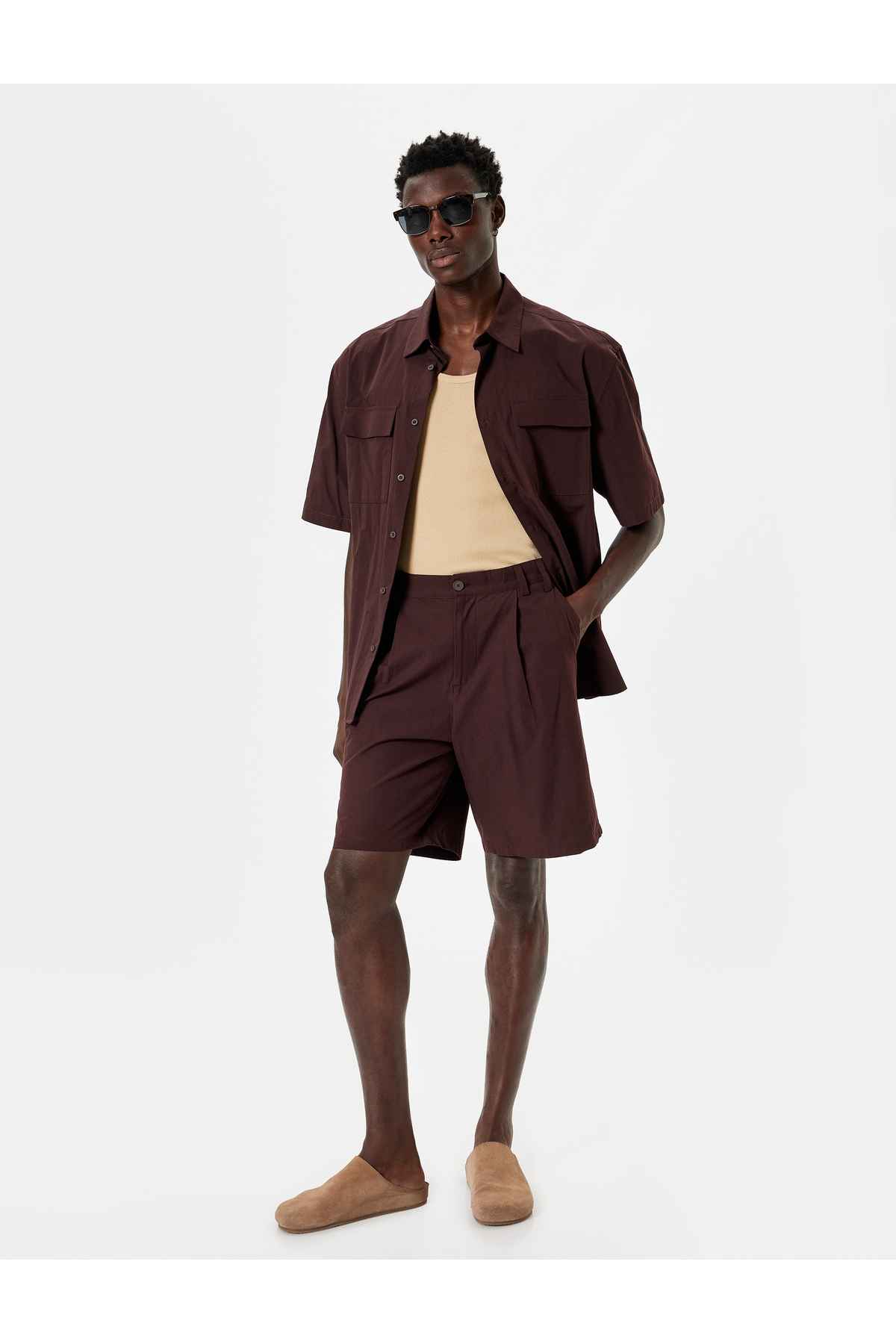 شلوارک پارچه ای جیب پلیسه دار با جزئیات